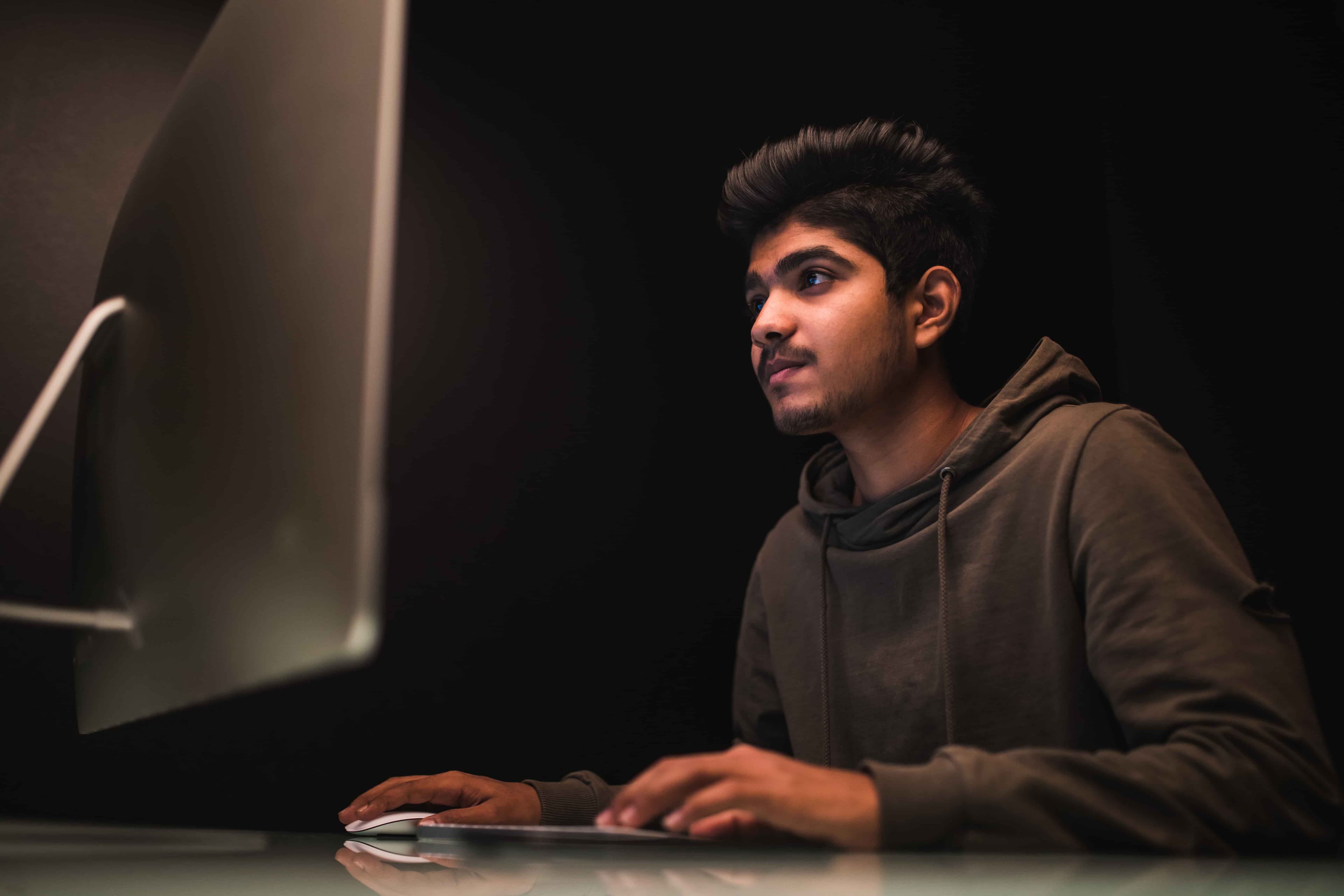 Pre-vetted software developer working on a laptop